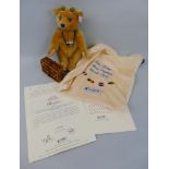 A Steiff Traveller teddy bear, limited edition number 948/2003, in original bag with certificate,