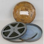 A 16mm monochrome and silent reel of film, showing the construction of the Regal Cinema in