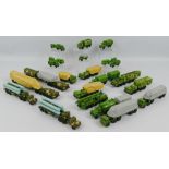 A collection of twenty two RoCo Austria plastic military vehicles, including various transporters,