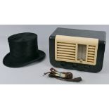 An Ekco Type U29 Bakelite cased radio, 31cm wide and a gents top hat inscribed Tom Gray Hatter and