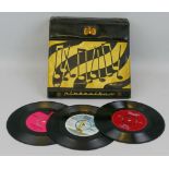 A 1960's vinyl record case containing seven Beatles EP's/singles, four Shadows singles and others by