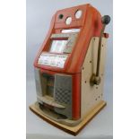 A Mills Bell-o-Matic arcade fruit machine, in aluminium and red painted case with formica type sides