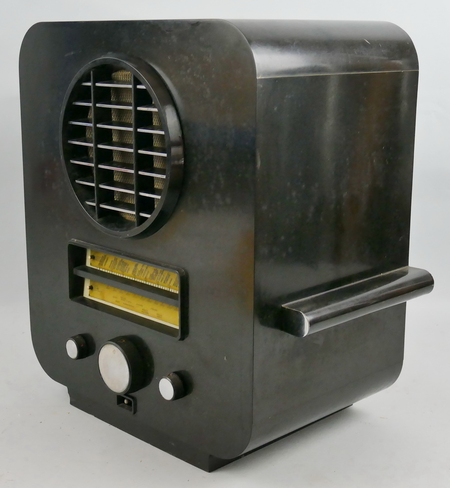 An Ekco All Electric Radio Type AC-74 Superhet black bakelite cased radio, in Art Deco style case