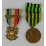 A pair of Franco - Prussian War Medals, one cast as battle trophies and inscribed Oublier Jamais