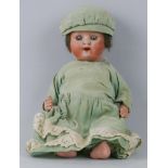 A Johann Walther and Sohn bisque head doll, with applied hair, sleeping eyes, open mouth with