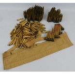 A collection of Lee Enfield rifle shells/bullets, comprising approximately one hundred spent/