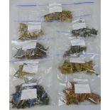 A quantity of various scale plastic and die-cast model soldiers, predominantly in WWII uniforms,