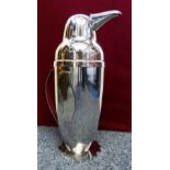 An electroplated novelty cocktail shaker in the form of a penguin, hinged beak, 31cm