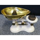 A Boots brass and painted cast iron kitchen scale set with various weights