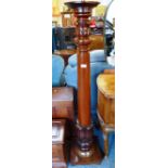 A mahogany torchiere stand with Victorian turned and carved column, 140cm high