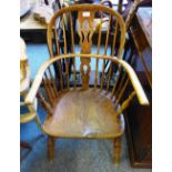 A Victorian ash and elm low back Windsor chair, with pierced splat and H-stretcher