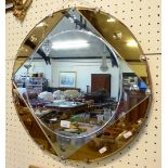 An Art Deco circular multicoloured mirror of geometric design, 55cm diameter