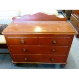 A Victorian stained pine chest of two short and two long graduated drawers on turned feet, 107 cm