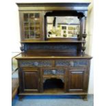 An early 20th century oak mirror back sideboard, the high back with astragal glazed display