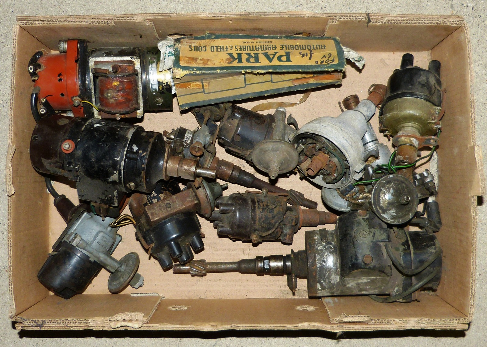 A quantity of used distributors of various sizes.