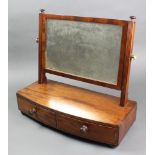 A 19th Century rectangular plate dressing table mirror contained in a mahogany swing frame with