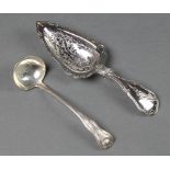 A George III silver fiddle pattern toddy ladle Edinburgh 1818 together with a silver serving spoon