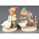 A Hummel figure of a boy and goose 1932/0 4", a ditto of a girl with geese 473/0 4"