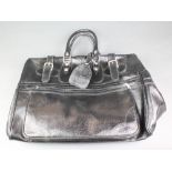 A Top Line black leather valise