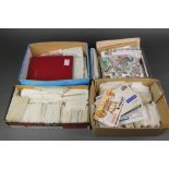 4 shallow boxes of various loose world stamps