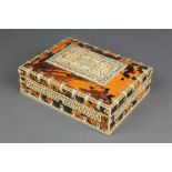 A 19th Century Indian tortoiseshell and ivory mounted trinket box of rectangular form with hinged