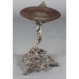 A 19th Century bronze twin handled table centrepiece, raised on an associated Rococo style pierced