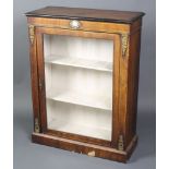 A Victorian walnut Pier cabinet with oval porcelain floral panel and gilt metal mounts, inlaid