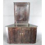 A 19th Century pine double corner cabinet, the upper section with moulded cornice and cupboard