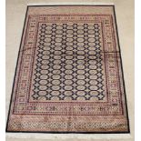 A contemporary blue ground Bokhara style Belgian cotton carpet 59" x 64"