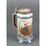 A Mettlach tankard, the body decorated with revellers, having pewter mounts, stamped 2230 8"