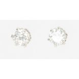 A pair of 18ct white gold brilliant cut single stone diamond ear studs, each approx. 0.5ct