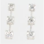 A pair of 18ct white gold 3 stone diamond drop earrings approx 1.15ct