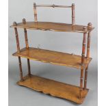 A Victorian rectangular 3 tier hanging wall shelf with bamboo supports 23"h x 20"w x 7"d There is