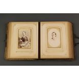 A Victorian leather bound photograph album