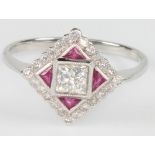 An 18ct white gold ruby and diamond Art Deco style ring, size N 1/2