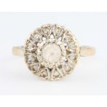 A 9ct yellow gold cluster ring size L