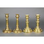 2 pairs of 19th Century brass candlesticks with ejectors 7" and 8" Within each pair 1 stick is