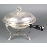 A silver plated food warmer and cover with ebony handle on stand The burner is missing