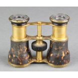 Ross & Co Bombay, a pair of gilt metal and tortoiseshell effect opera glasses There is slight