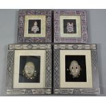4 various "South American" carved wooden masks contained in carved frames