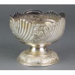 An Edwardian repousse silver rose bowl with demi-fluted and floral decoration Sheffield 1903, 300