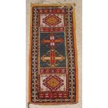 A yellow and blue ground Turkish style runner 53" x 24"