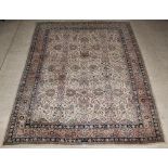 A white and pink floral patterned Persian rug with floral design, signed 152" x 118", some wear