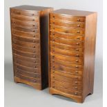 A pair of Victorian style mahogany bow front chests of 14 shallow drawers, raised on bracket feet 36