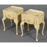 A pair of Continental style white and floral painted bedside tables of serpentine outline with