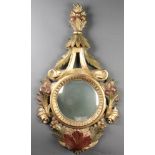 A Regency style gilt and polychrome carved wooden convex wall mirror 29" x 17" There is a slight