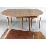 A Georgian oval drop flap D end dining table with 3 extra leaves, raised on 10 tapered supports 28"h