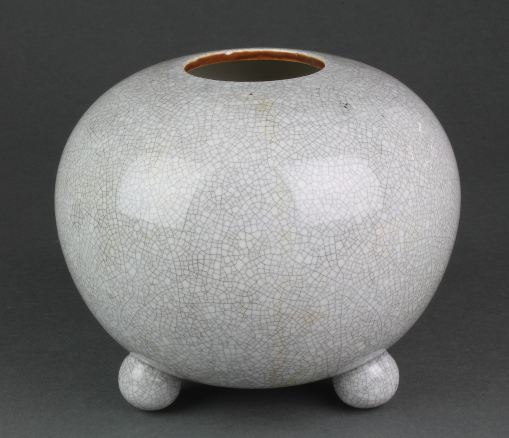 A 20th Century studio pottery spherical crackle glazed vase on ball feet 6" There is a minor chip to