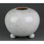 A 20th Century studio pottery spherical crackle glazed vase on ball feet 6" There is a minor chip to