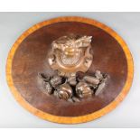 A pair of Italian carved walnut panels decorated dogs masks 19" x 14", ditto carved a boar's head